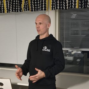 Registered dietitian giving a sports nutrition lecture to athletes and coaches